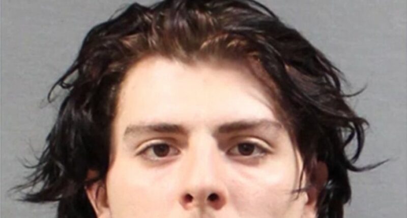 Mugshot of a 22-year-old father accused of killing his four-week-old daughter.