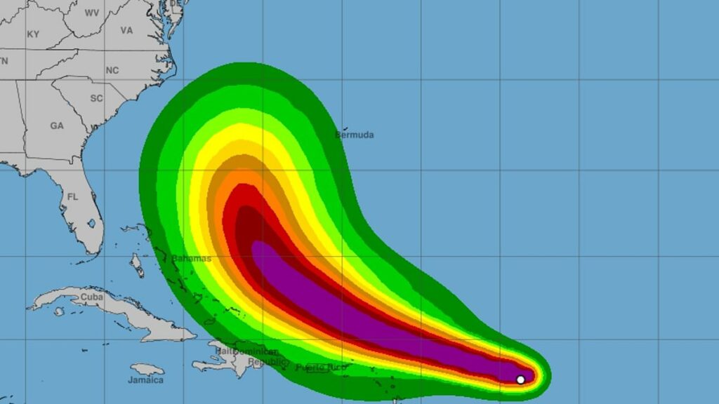 Deadly storm Erin is upgraded to hurricane status