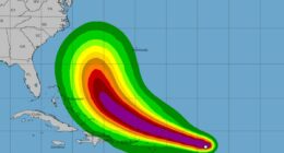 Deadly storm Erin is upgraded to hurricane status