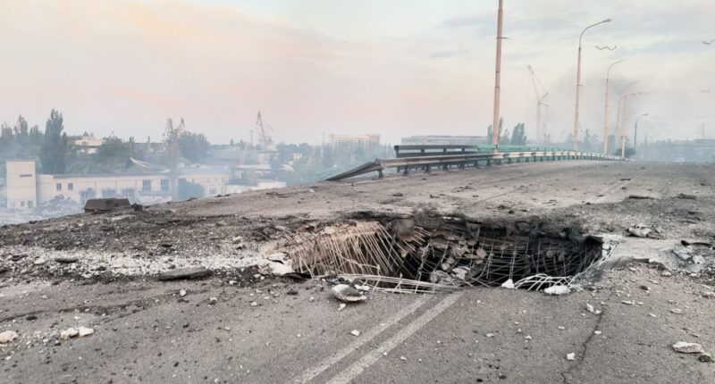 Damaged road bridge in Kherson, Ukraine, after a Russian attack.