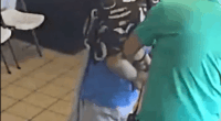 Arrest of a suspect in a hair salon.