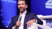 Donald Trump Jr. speaking at a conference.