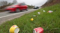 Litter beside a road.