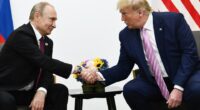 Presidents Putin and Trump shaking hands at a meeting.