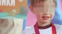 Photo of Vladimir Putin's youngest son with his face blurred.