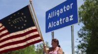 Florida updated agreement on handling detainees at 'Alligator Alcatraz,' but a month after it opened