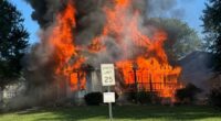 House engulfed in flames.