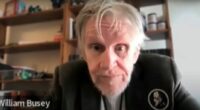 Headshot of William Busey.