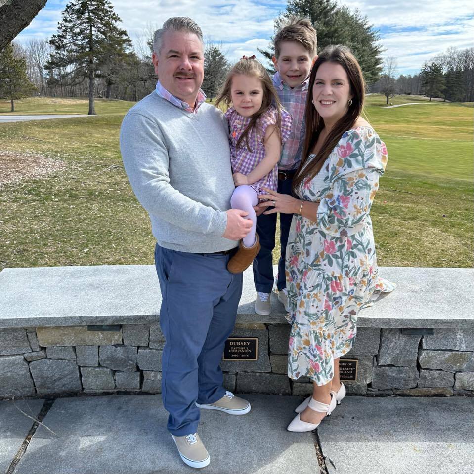 Family photo of four.