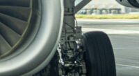 Story from Jam Press (Plane Tyre Terror) Pictured: The exploded tyre (left). VIDEO: Brit holidaymakers terrified after plane tyre explodes in freak one-in-10,000 take off accident A Brit family jetting home from a Mediterranean holiday were terrified after a plane tyre exploded in a freak one-in-10,000 take off accident. Kris Sadler was petrified when the blow out happened just as the plane was about to lift off. He videoed the shocking explosion and the scary vibrations it caused to the wing. Kris was returning from Corfu to Birmingham, with wife Katie and sons, Olly, 13, and Zach, 9. They were on a TUI jet when the nerve shredding blast happened. "It was scary," Kris, from Telford, Shropshire, told, Luxury Travel Daily. "There were bits of tyre flying everywhere. "The whole wing was rippling. "I knew something was wrong but the crew took two hours to tell us. "I don't blame them - the crew were brilliant. "The pilot was good - thank goodness we had a pilot who trains other pilots. "He told us he was handing over to his co pilot to fly us home. "But later he told us he would be landing because we'd lost a tyre. "He said the plane was a hundred per cent safe but passengers had to take precautions and go into the brace position. "And as we came into touch down the crew were saying, 'heads down, heads down, heads down' repeatedly which kind of makes you panic more. "It was pretty crazy. "It's a one-in-10,000 chance of a plane tyre blowing - so that's mine tocked off. "It's probably never going to happen again." The photographer added that emergency crews were prepared when they landed at Birmingham. "They hosed down the broken wheel," he said. "It looked like there were sparks when we landed but the landing was very good. "It was a bit bumpy because it was running on a flat tyre. "But it has other tyres so I suppose we knew we'd be OK. "I was just trying to hold it together for the kids - and my wife was trying to hold it together. "And she did until we landed and then it all came out. "I was saying to them, 'it's all ok' but I was thinking, 'bloody hell if this goes wrong'. "I didn't know if there was more damage to the landing gear - and nor did the crew. "But the pilot lowered the landing gear 15 minutes before we were due to land and I know they never do it that early. "Then a black military jet appeared next to us and flew all the way in to landing with us. "It had come to scout out the landing gear and tyre to see if it was OK. "All the passengers cheered and clapped when we landed. "The pilot came out and bowed. "I don't know how dangerous it really was. "We may never have been in danger - or it might have been very dangerous and the pilot just pulled it off. "There were some tears - but it was great to get back on solid ground and all safe." TUI has been approached for comment. ENDS EDITOR'S NOTE: Video Usage Licence: (NON-EXCLUSIVE) We have obtained a non-exclusive licence from the copyright holder. A copy of the licence is available on request. Video Restrictions: None.