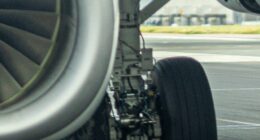 Story from Jam Press (Plane Tyre Terror) Pictured: The exploded tyre (left). VIDEO: Brit holidaymakers terrified after plane tyre explodes in freak one-in-10,000 take off accident A Brit family jetting home from a Mediterranean holiday were terrified after a plane tyre exploded in a freak one-in-10,000 take off accident. Kris Sadler was petrified when the blow out happened just as the plane was about to lift off. He videoed the shocking explosion and the scary vibrations it caused to the wing. Kris was returning from Corfu to Birmingham, with wife Katie and sons, Olly, 13, and Zach, 9. They were on a TUI jet when the nerve shredding blast happened. "It was scary," Kris, from Telford, Shropshire, told, Luxury Travel Daily. "There were bits of tyre flying everywhere. "The whole wing was rippling. "I knew something was wrong but the crew took two hours to tell us. "I don't blame them - the crew were brilliant. "The pilot was good - thank goodness we had a pilot who trains other pilots. "He told us he was handing over to his co pilot to fly us home. "But later he told us he would be landing because we'd lost a tyre. "He said the plane was a hundred per cent safe but passengers had to take precautions and go into the brace position. "And as we came into touch down the crew were saying, 'heads down, heads down, heads down' repeatedly which kind of makes you panic more. "It was pretty crazy. "It's a one-in-10,000 chance of a plane tyre blowing - so that's mine tocked off. "It's probably never going to happen again." The photographer added that emergency crews were prepared when they landed at Birmingham. "They hosed down the broken wheel," he said. "It looked like there were sparks when we landed but the landing was very good. "It was a bit bumpy because it was running on a flat tyre. "But it has other tyres so I suppose we knew we'd be OK. "I was just trying to hold it together for the kids - and my wife was trying to hold it together. "And she did until we landed and then it all came out. "I was saying to them, 'it's all ok' but I was thinking, 'bloody hell if this goes wrong'. "I didn't know if there was more damage to the landing gear - and nor did the crew. "But the pilot lowered the landing gear 15 minutes before we were due to land and I know they never do it that early. "Then a black military jet appeared next to us and flew all the way in to landing with us. "It had come to scout out the landing gear and tyre to see if it was OK. "All the passengers cheered and clapped when we landed. "The pilot came out and bowed. "I don't know how dangerous it really was. "We may never have been in danger - or it might have been very dangerous and the pilot just pulled it off. "There were some tears - but it was great to get back on solid ground and all safe." TUI has been approached for comment. ENDS EDITOR'S NOTE: Video Usage Licence: (NON-EXCLUSIVE) We have obtained a non-exclusive licence from the copyright holder. A copy of the licence is available on request. Video Restrictions: None.