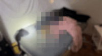 Blurred image of a crime scene.