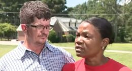 Couple being interviewed about a forged deed.