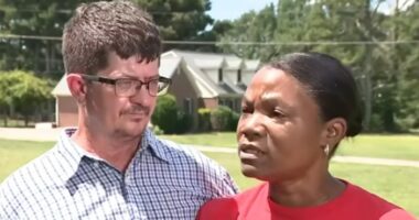 Couple being interviewed about a forged deed.