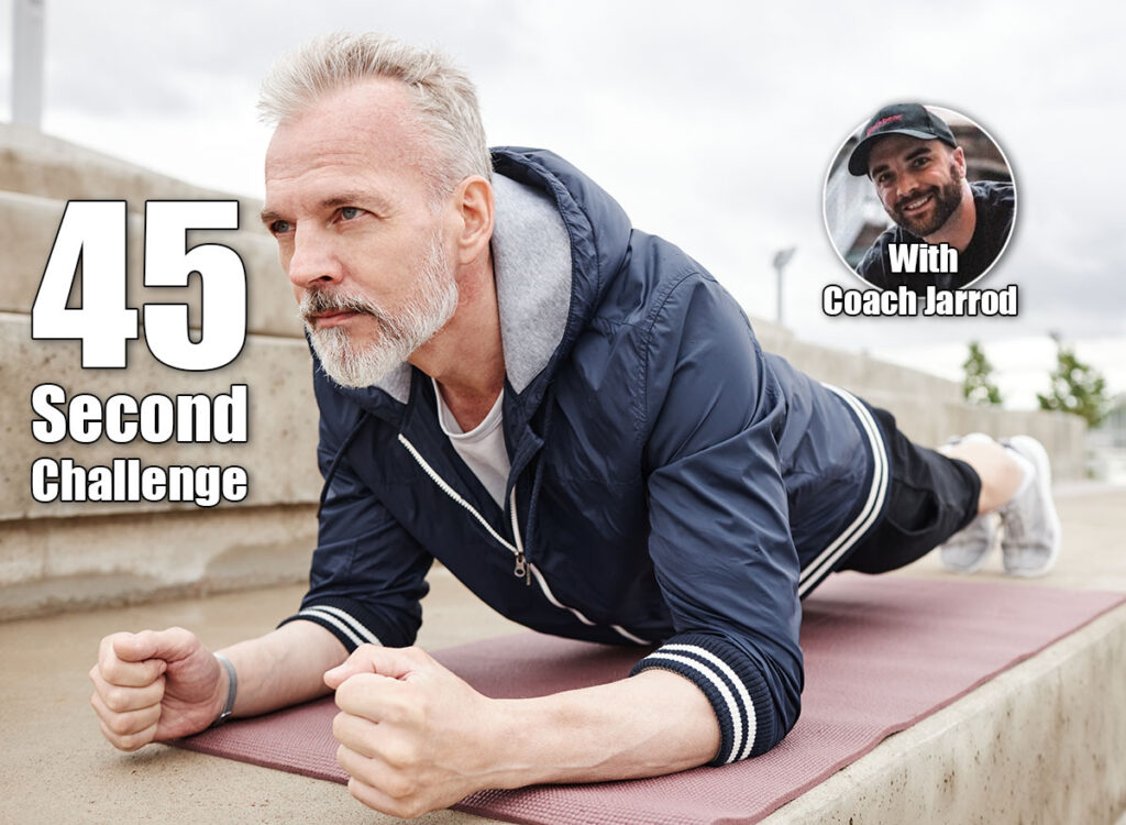 Sporty determined elderly man holding plank position on yoga mat strengthening core muscles during everyday workout at city park. If You Can Hold This Position for 45 Seconds, Your Strength Is Elite After 50. Cover