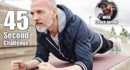 Sporty determined elderly man holding plank position on yoga mat strengthening core muscles during everyday workout at city park. If You Can Hold This Position for 45 Seconds, Your Strength Is Elite After 50. Cover