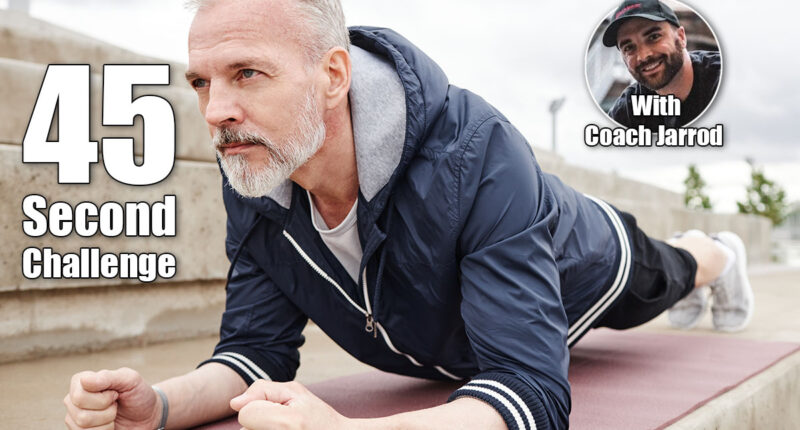 Sporty determined elderly man holding plank position on yoga mat strengthening core muscles during everyday workout at city park. If You Can Hold This Position for 45 Seconds, Your Strength Is Elite After 50. Cover