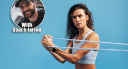 Portrait of young fitness female training with resistance band on blue background. If You