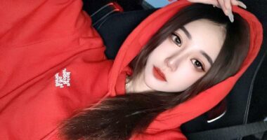 Photo of Irene Gu, a Taiwanese influencer, in a red hoodie.