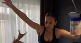Woman attempting a high-heeled shoes challenge, falling.