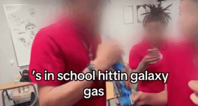 Students inhaling nitrous oxide in school.