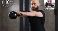Sportsman doing kettlebell swing during workout in gym. Is 10 Minutes of Exercise Daily Enough to Stay Strong? Cover