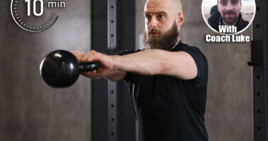 Sportsman doing kettlebell swing during workout in gym. Is 10 Minutes of Exercise Daily Enough to Stay Strong? Cover