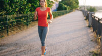 Young fitness woman running outdoor
