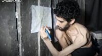 Screengrab of a malnourished Israeli hostage drawing on a wall.