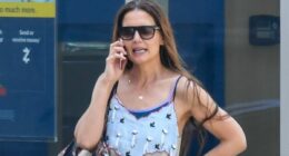Katie Holmes has passionate conversation on her phone