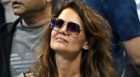 Katie Holmes looks stylish in a figure-hugging dress at the US Open