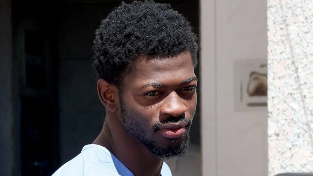 Lil Nas X wears blue prison jumpsuit while leaving LA court
