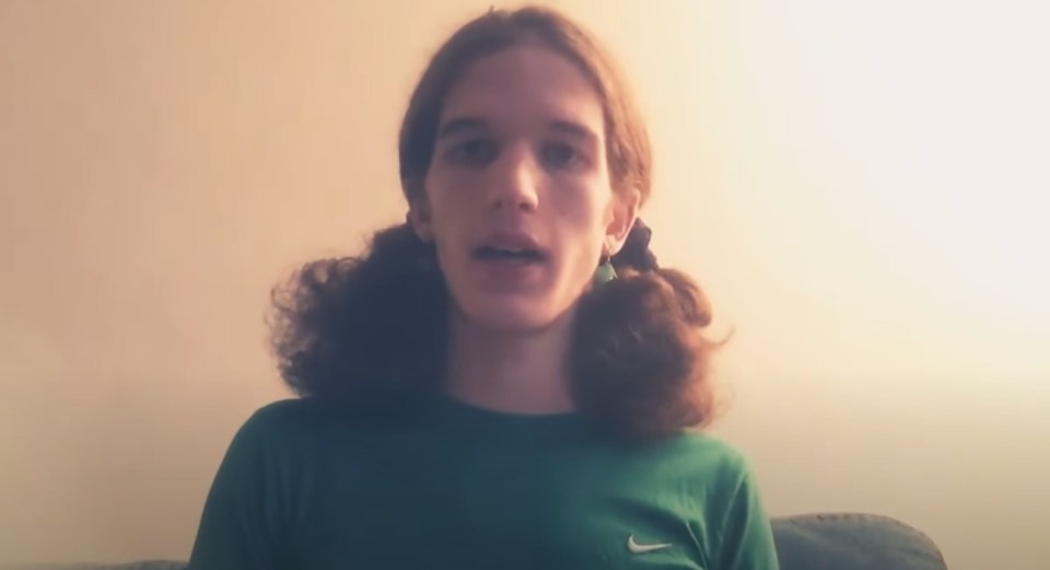 Screenshot of a person speaking.