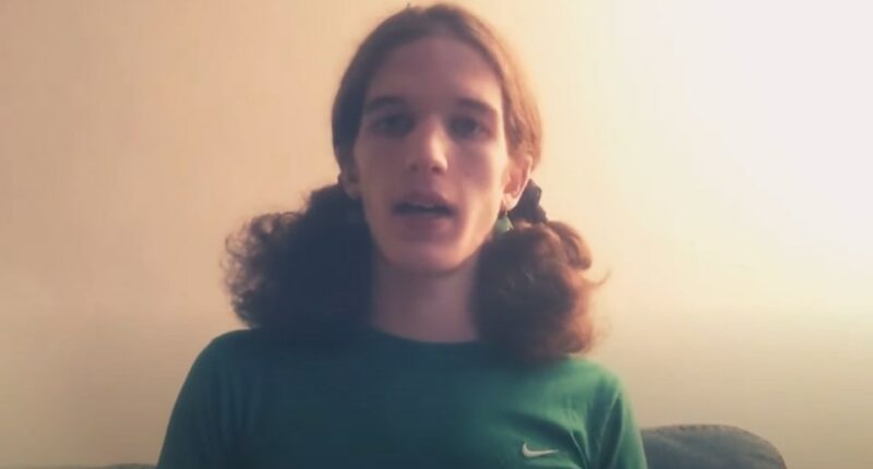 Screenshot of a person speaking.