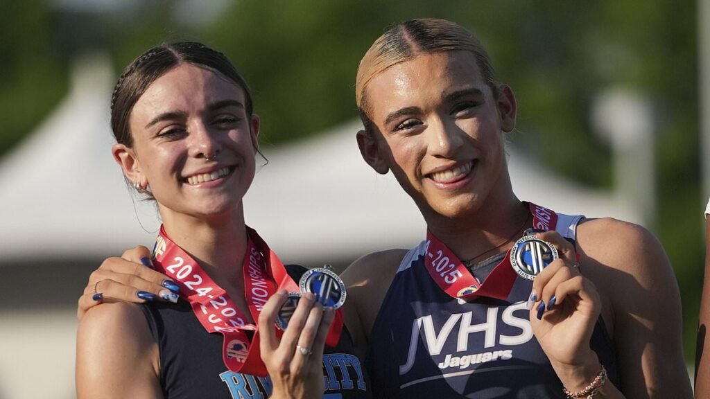 Mom of trans athlete attacks critics at fiery school board meeting