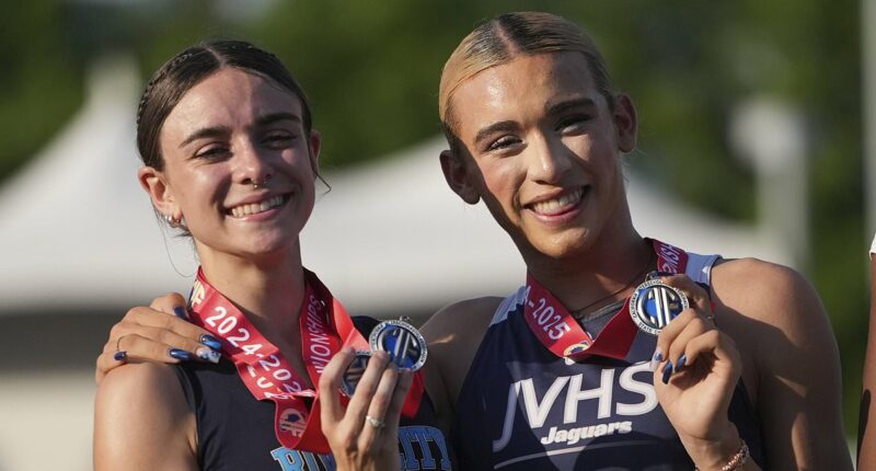 Mom of trans athlete attacks critics at fiery school board meeting