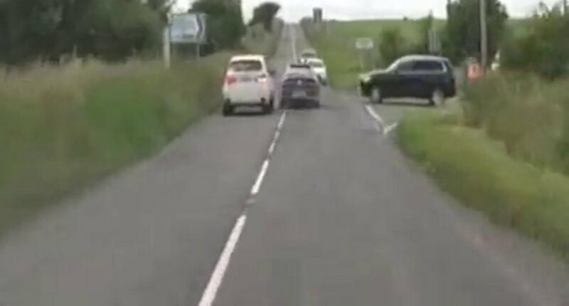 Police pursuit on a country road.