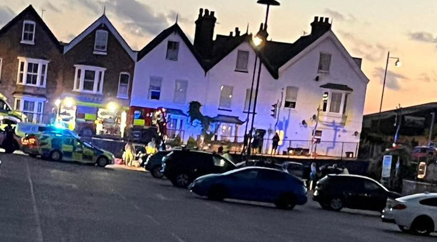 Emergency vehicles at the scene of a car accident.