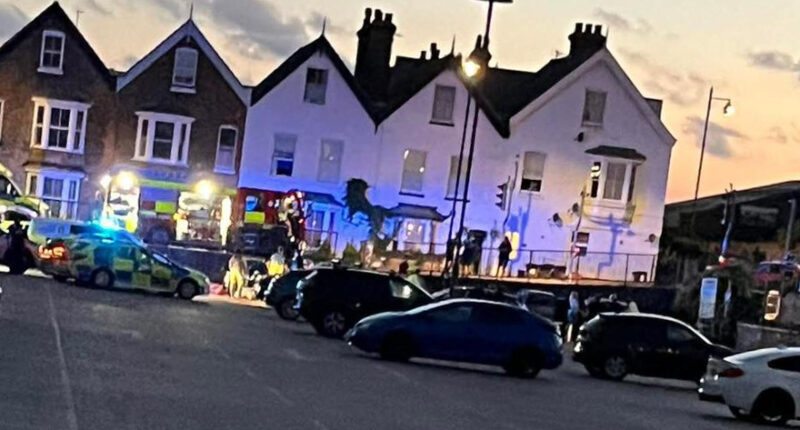 Emergency vehicles at the scene of a car accident.