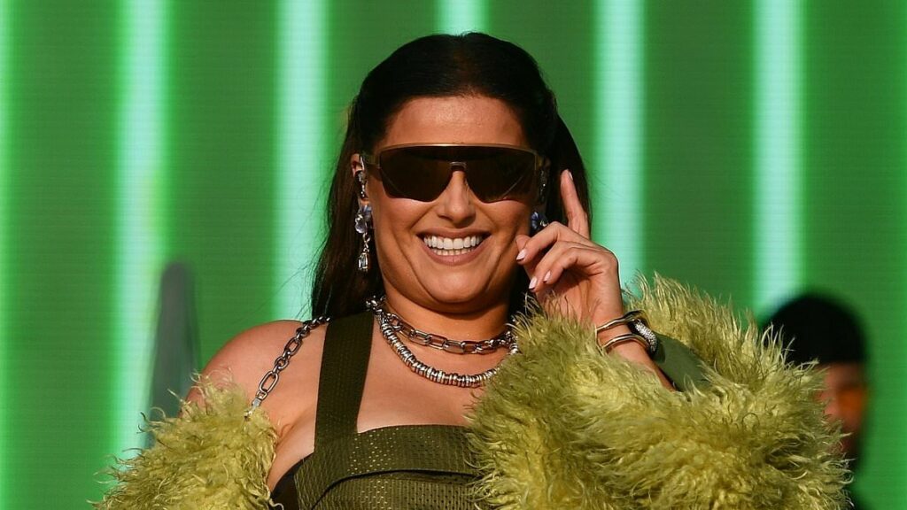 Nelly Furtado, 47, puts on a leggy displayi n ruffled hotpants