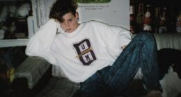 Photo of Amy Bradley sitting on a couch.