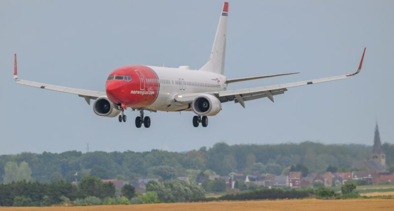 Norwegian Air Shuttle Boeing 737-8JP landing at Zaventem Airport.