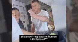 A man on an airplane yelling at another passenger.