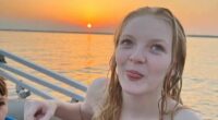 Photo of Katelynn, a pregnant 17-year-old girl, on a boat at sunset.