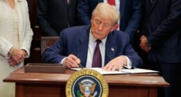 President Trump signing an executive order.