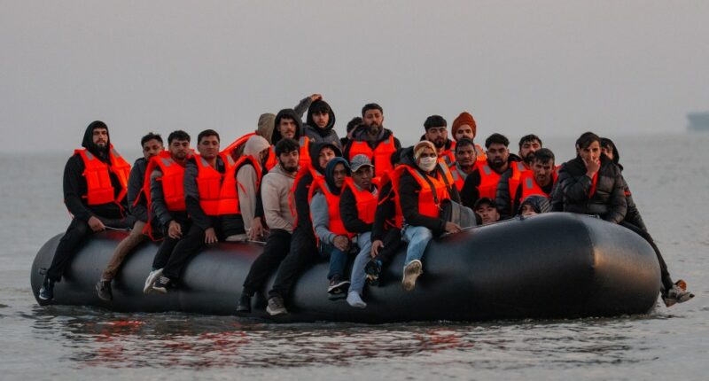 Migrants in a small boat in the English Channel.