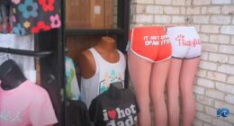 Provocative and profane merchandise displayed on mannequins in a Virginia Beach storefront.