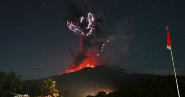 Stunning photos capture moment one of Indonesia's most active volcanoes erupts