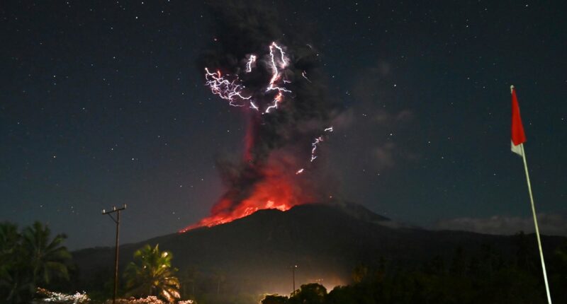 Stunning photos capture moment one of Indonesia's most active volcanoes erupts