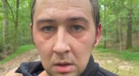 Photo of a sweaty man in a dark hoodie, with a Tennessee Bureau of Investigation logo.